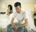anxious-man-sat-on-the-end-of-his-bed-wondering-if-erectile-dysfunction-can-be-reversed